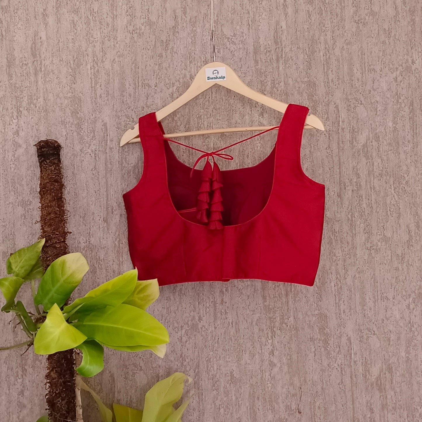 Red Sleeveless Blouse